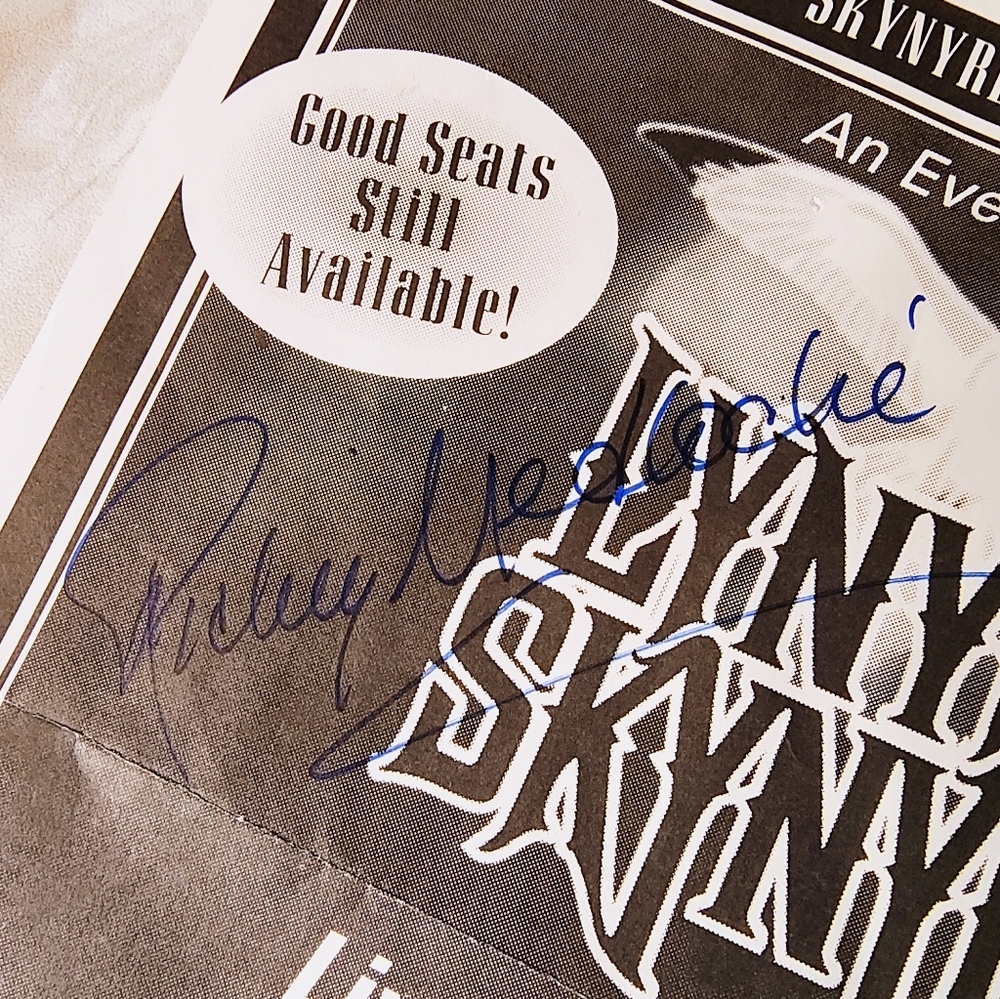 Autographed Lynyrd Skynyrd concert flyer.